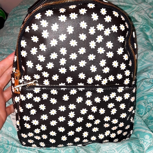No Boundaries Handbags - No boundaries daisy printed mini backpack. New with tags